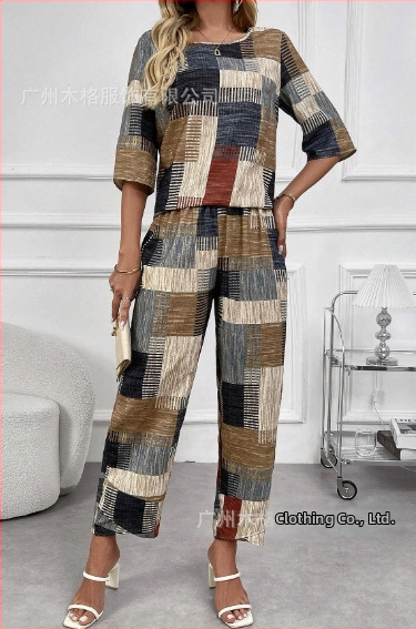 2025. aasta Euroopa ja Ameerika piiriülene moodne uus suvine geomeetrilise mustriga lühikeste varrukatega topp ja porgandipüksid