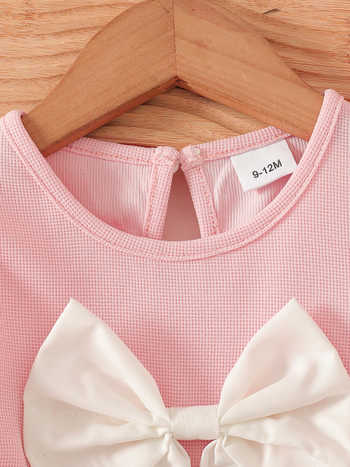 Új, egyszínű rózsaszín masni díszítésű felsők, gyermek farmernadrág, baba kétrészes szett, kislány kosztüm