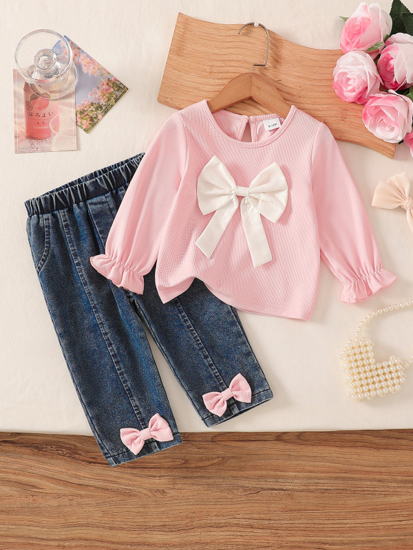 Új, egyszínű rózsaszín masni díszítésű felsők, gyermek farmernadrág, baba kétrészes szett, kislány kosztüm