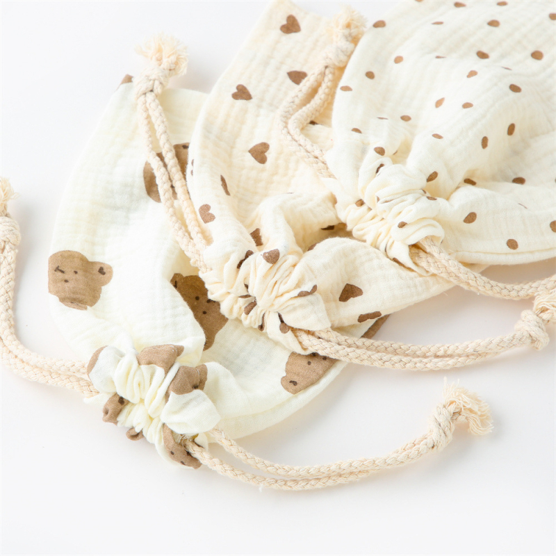 Kahekihilised köiega klapiga taskupüksid Puhast puuvillast trükitud krepp Beebi süljega rätik Rahustav rätik Väikeste esemete hoiustamine Riidekott Riputatav kott