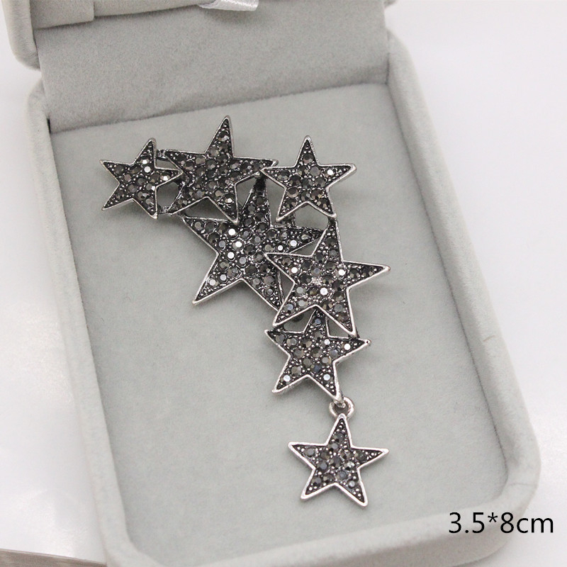 AliExpressen népszerű divatos vintage ősi ezüst pisztoly fekete strassz ötágú csillag bross tű kabát kiegészítők férfiaknak és nőknek női ruhaderék