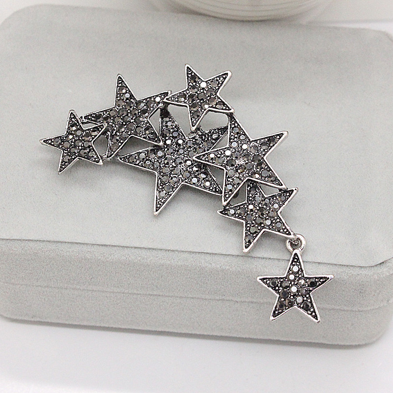 AliExpressen népszerű divatos vintage ősi ezüst pisztoly fekete strassz ötágú csillag bross tű kabát kiegészítők férfiaknak és nőknek női ruhaderék