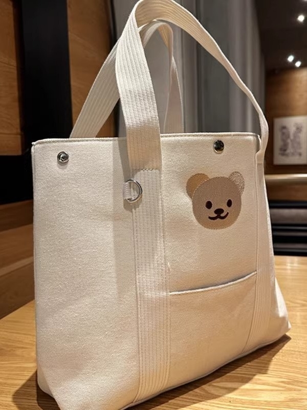 Vállra szerelhető múmiatáska, hímzett medvés vászon kézitáska, nagy kapacitású táska, anya-babatáska, kimenő tárolótáska