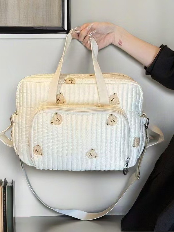 Pietų Korėjoje pristatytas naujas siuvinėto meškiuko mamos krepšys, didelės talpos vystyklų laikymo krepšys, nešiojamas kelioninis krepšys mamai ir kūdikiui.