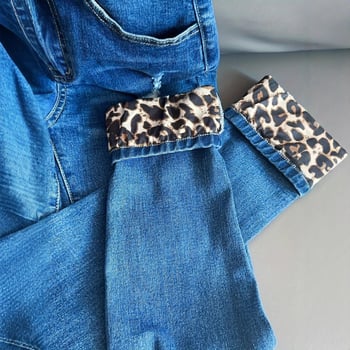 Európai és amerikai új női ruházati határokon átnyúló, karcsúsított, szakadt leopárdmintás, foltos, hengerelt szegélyű farmernadrág