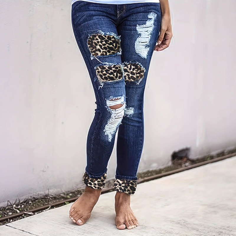 Európai és amerikai új női ruházati határokon átnyúló, karcsúsított, szakadt leopárdmintás, foltos, hengerelt szegélyű farmernadrág