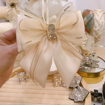 Kora tavaszi 2023 új koreai stílusú szövet strassz masni hajtű női fejdísz egyszerű elegáns felső klipsz fejdísz