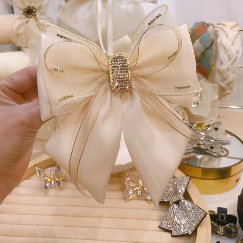 Kora tavaszi 2023 új koreai stílusú szövet strassz masni hajtű női fejdísz egyszerű elegáns felső klipsz fejdísz