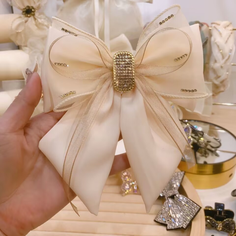 Kora tavaszi 2023 új koreai stílusú szövet strassz masni hajtű női fejdísz egyszerű elegáns felső klipsz fejdísz