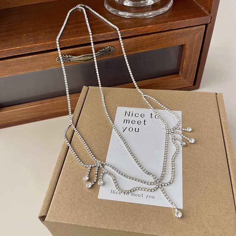 Európai és amerikai népszerű, egyszerű és elegáns strasszos hajlánc, divatos vízcsepp alakú homloklánc, európai és amerikai női hajkiegészítők, hajlánc