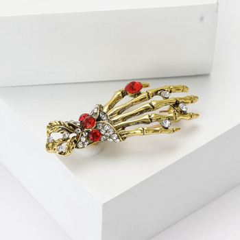 Európai és amerikai retro ötvözet strassz csontváz kéz csont bross személyiség punk stílusú férfi és női ruházati ékszertű