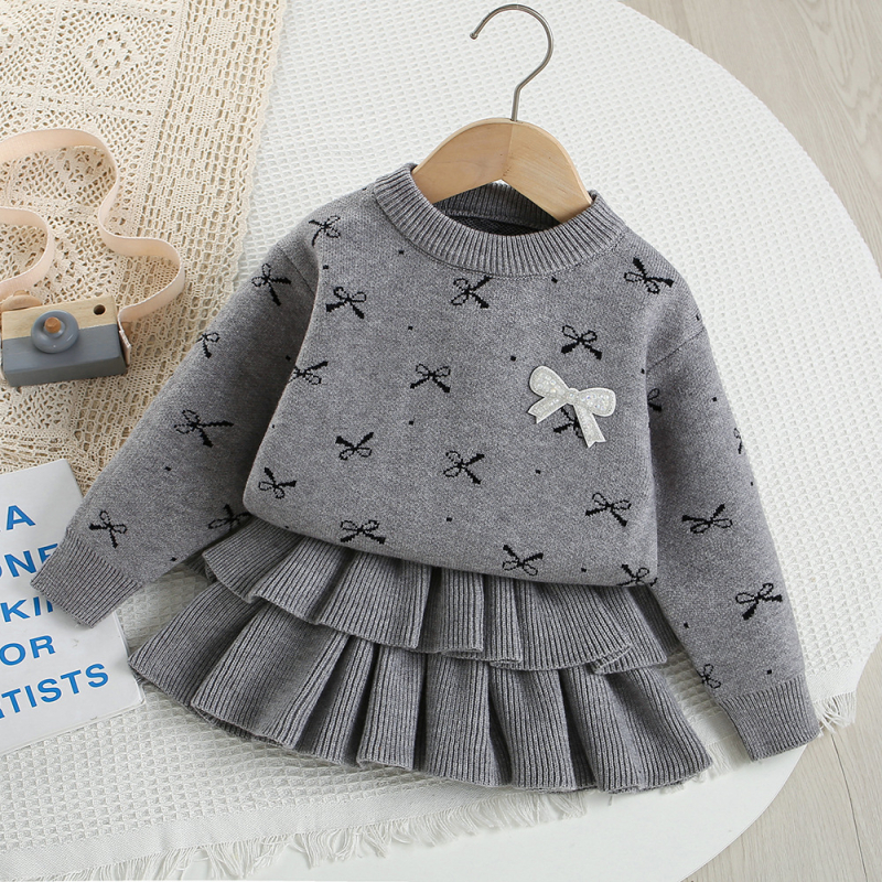 Lányka pulóver kosztüm tavaszi és őszi új koreai stílusú külföldi stílusú masni gyerek kötött pulóver tortaszoknya kétrészes szett