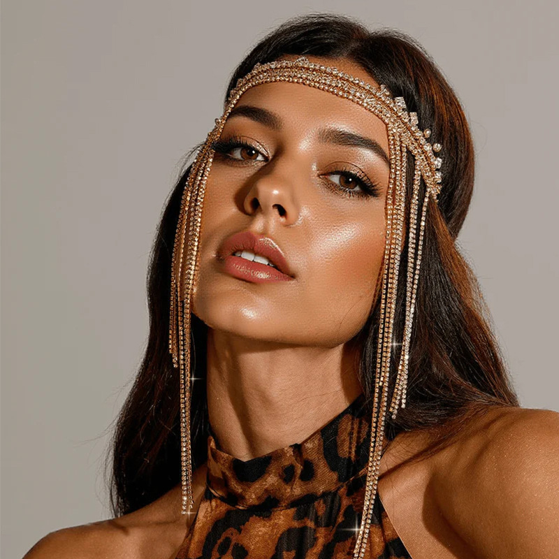 Eristuv ja populaarne lääne regiooni laubakett, kuulus etnilise stiiliga rhinestone`i tutiga juuksepael, ehhinopaelaga peakatted naistele