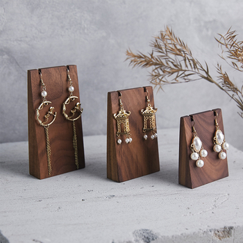 Pähklipuust kallid kõrvarõngad kõrvarõngaste alus täispuidust kaubanduskeskuse lihtne laskmisrekvisiitide kiosk ehete vitriin