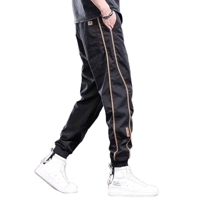 Suvised õhukesed vabaajapüksid meestele. Trendikas brändi niši disainiga spordiretuusid 2025. aasta uued mitmekülgsed mustad meeste püksid.