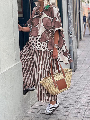 Amazon διασυνοριακό νέο καλοκαιρινό ανεξάρτητο σταθμό Ευρωπαίων και Αμερικανών γυναικών με χαλαρή εκτύπωση λουλουδιών στο πέτο, casual κοστούμι μόδας