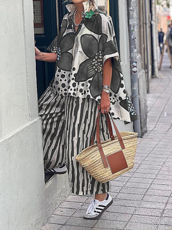 Amazon διασυνοριακό νέο καλοκαιρινό ανεξάρτητο σταθμό Ευρωπαίων και Αμερικανών γυναικών με χαλαρή εκτύπωση λουλουδιών στο πέτο, casual κοστούμι μόδας