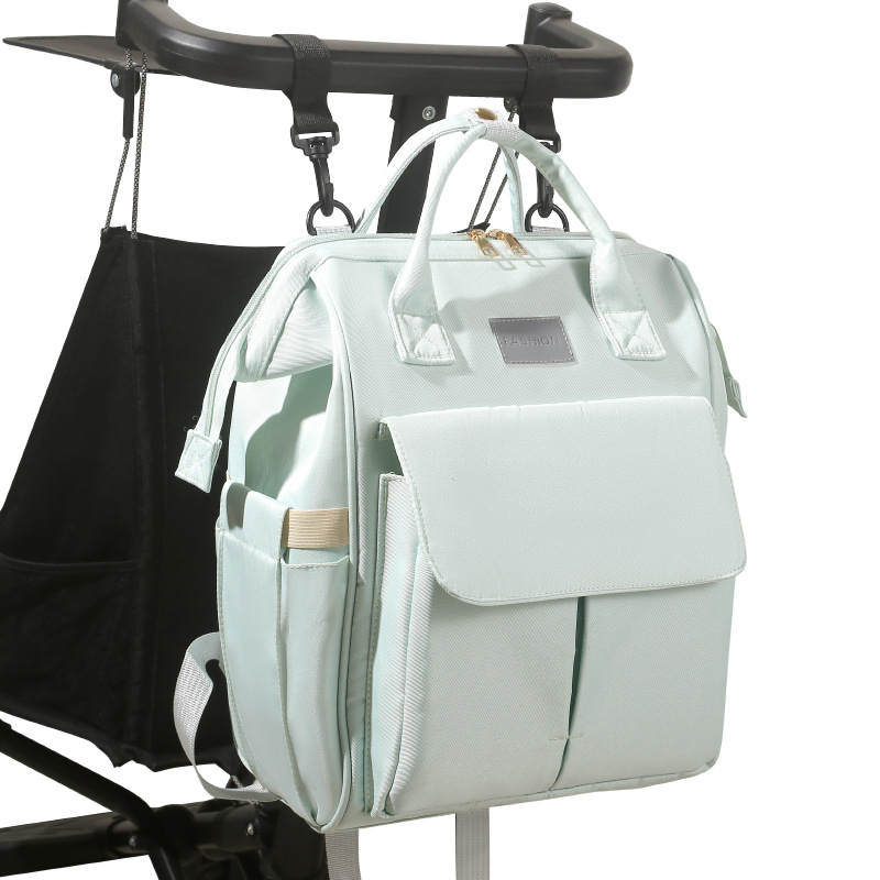 Suur emmekott piiriülene uus suure mahutavusega kaasaskantav seljakott beebitarvete hoiustamiseks, mida saab riputada jalutuskäru ema- ja beebikoti külge