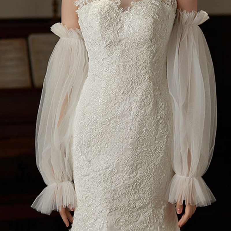 Piiriülesed pruudi võrkvarrukad päikesekaitsekreemi dekoratiivsed varrukad lahtise stiiliga sarvvarrukatega perspektiivsed pulmakleidi kaunistused hulgimüük