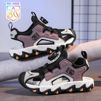 Meiteņu sandales 2025. gada vasarai Zēnu sieta pretslīdes sandales Baotou pludmales apavi ar pogu sprādzi Populāras bērnu sandales