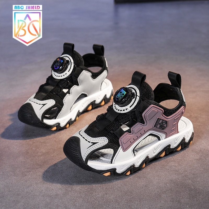 Meiteņu sandales 2025. gada vasarai Zēnu sieta pretslīdes sandales Baotou pludmales apavi ar pogu sprādzi Populāras bērnu sandales