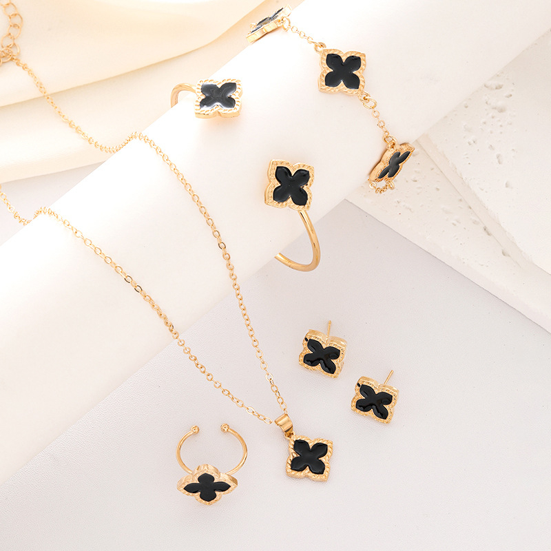 Piiriülesed värsked neljalehelised ristikheinast ehted, mis sobivad Euroopa ja Ameerika õlitilga sulamist õnneliku rohu lillega kaelakee kõrvarõngad naistele