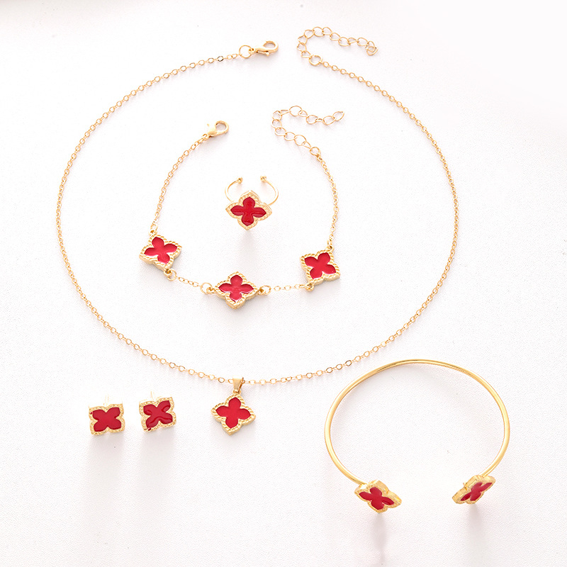 Piiriülesed värsked neljalehelised ristikheinast ehted, mis sobivad Euroopa ja Ameerika õlitilga sulamist õnneliku rohu lillega kaelakee kõrvarõngad naistele