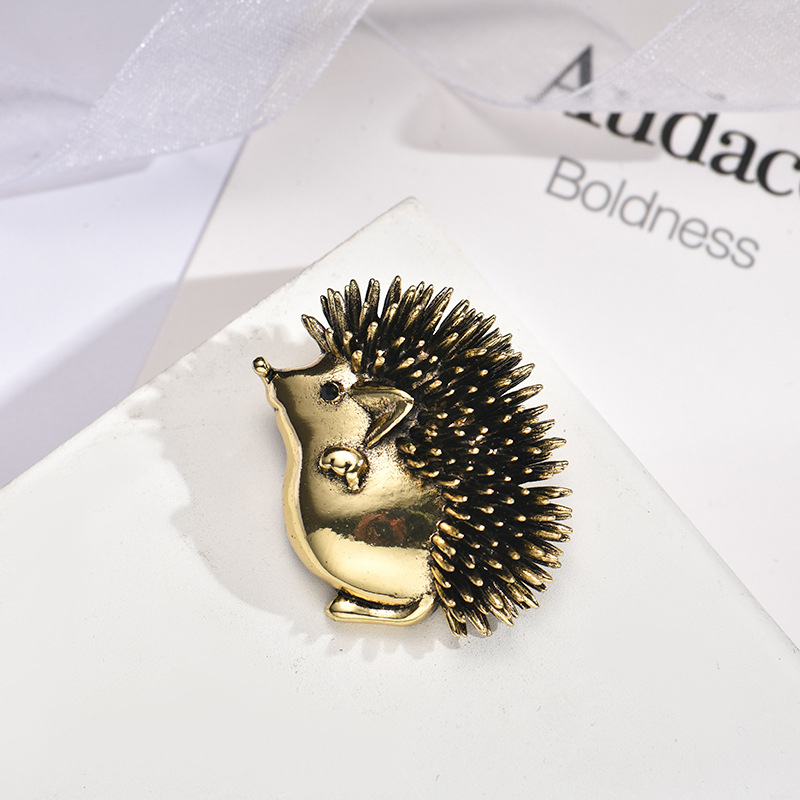 Armas väike siilipross, loominguline isiksus, sulamist koomiksifranki loomakujuline korsett, rõivaaksessuaarid, salli pandla, nööpnõel