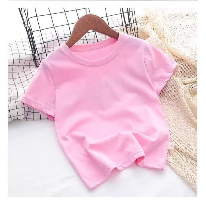 Poistele ja tüdrukutele mõeldud lihtne igapäevane ümara kaelusega T-särk Suvine lühikeste varrukatega Mitmekülgne vabaaja puhasvärviline puuvillane T-särk Poistele ja tüdrukutele samas stiilis pluusid