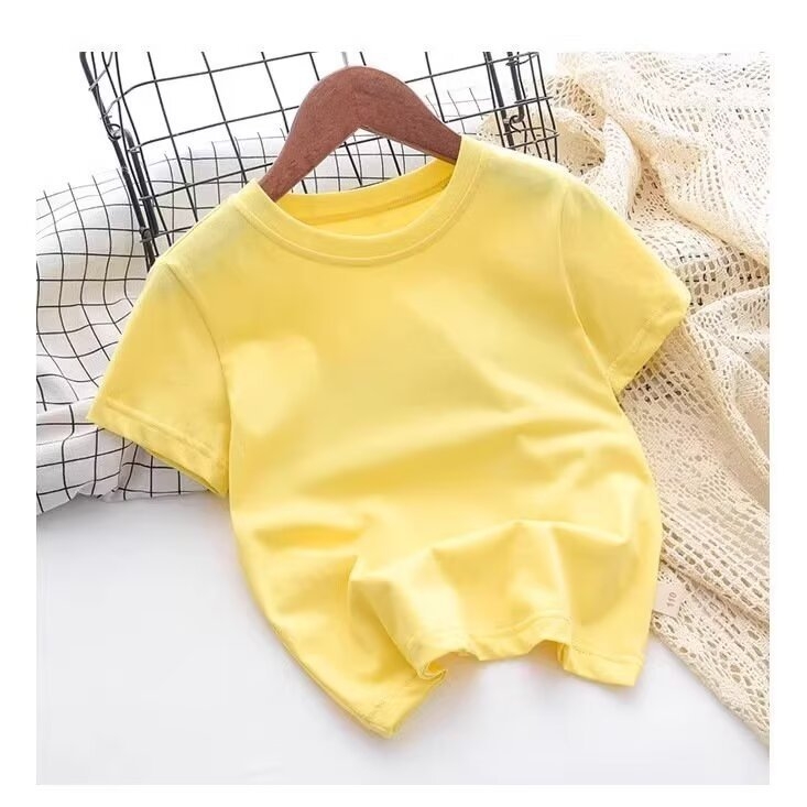 Poistele ja tüdrukutele mõeldud lihtne igapäevane ümara kaelusega T-särk Suvine lühikeste varrukatega Mitmekülgne vabaaja puhasvärviline puuvillane T-särk Poistele ja tüdrukutele samas stiilis pluusid