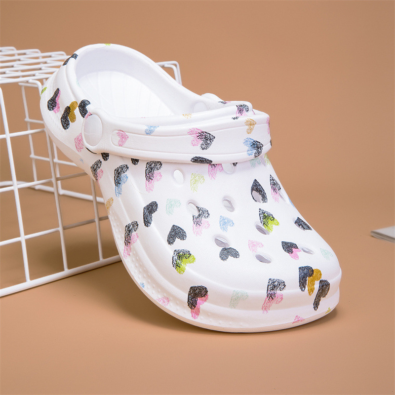 Pārrobežu bērnu čības 2025. gada vasaras jaunie caurumi zēniem un meitenēm iekštelpu jauki multfilmu apdrukāti pludmales apavi vairumtirdzniecībā