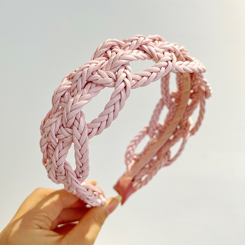 Piiriülene elegantne ühevärviline laia äärega juuksepael, käsitsi valmistatud õõnes nahast kootud keerutatud palmikuga juuksepael, naistele mõeldud tipptasemel juukseaksessuaarid