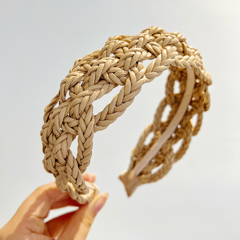 Piiriülene elegantne ühevärviline laia äärega juuksepael, käsitsi valmistatud õõnes nahast kootud keerutatud palmikuga juuksepael, naistele mõeldud tipptasemel juukseaksessuaarid