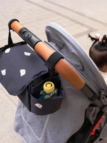 Νέα παιδική κρεμαστή τσάντα καροτσιού με αρκούδα, τσάντα μούμιας για ταξίδια, απαραίτητη τσάντα για πάνες, τσάντα αποθήκευσης μπουκαλιών, βολική