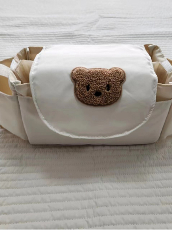 Νέα παιδική κρεμαστή τσάντα καροτσιού με αρκούδα, τσάντα μούμιας για ταξίδια, απαραίτητη τσάντα για πάνες, τσάντα αποθήκευσης μπουκαλιών, βολική