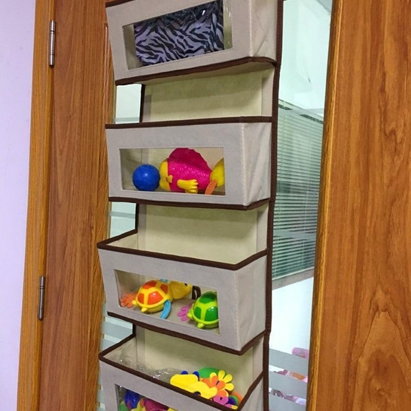 Viiekihiline lausriidest ukse tagumine hoiukott Neljakihiline läbipaistva aknaga ukse tagumine hoiukott Mitmekihiline organiseeriv riputuskott