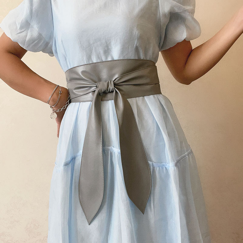 Europietiškos ir amerikietiškos mados platus PU diržas moteriškas paltas dekoratyviniu raišteliais su juosmeniu, aptemptas juosmuo su suknele [karštas išpardavimas tarpvalstybiniu mastu]