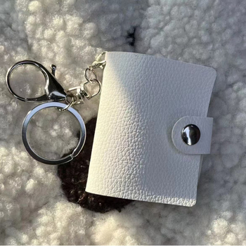 Νέο μίνι δερμάτινο άλμπουμ με μικρό κρεμαστό κόσμημα καρτών 2 ιντσών, αυτοκόλλητο φωτογραφιών αναμνηστικό άλμπουμ αποθήκευσης χονδρικής, υποστήριξη προμήθειας, προσαρμογή