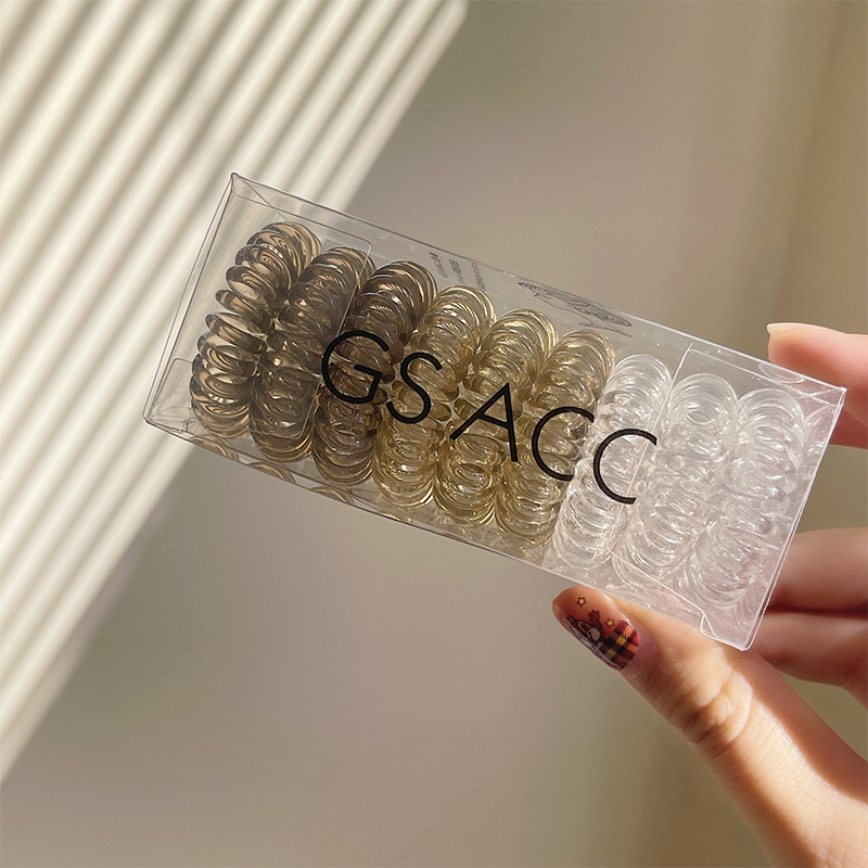 9 vnt. pakuotė ~ palaipsniui keičiami telefono linijos plaukų žiedai dėžutėje paprasti, labai elastingi, permatomi, be pėdsakų galvos apdangalai mergaitėms