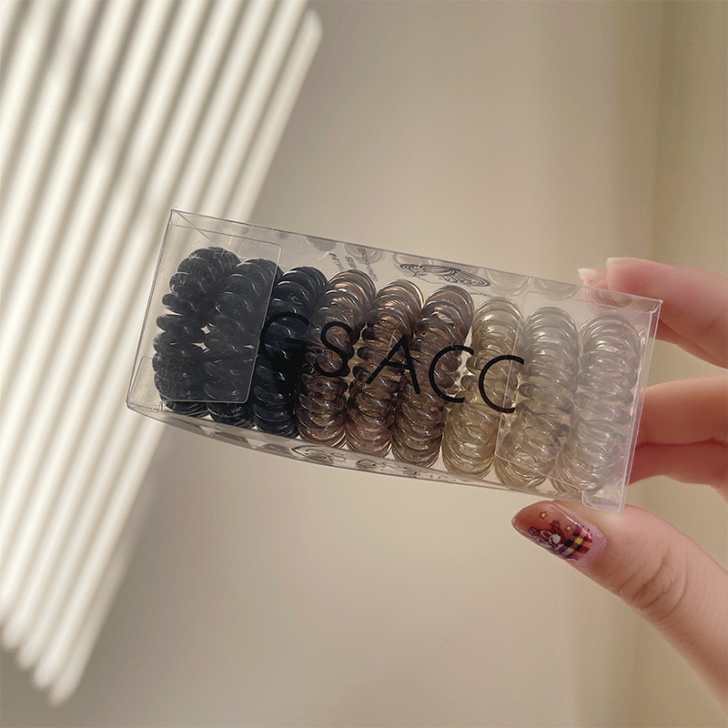 9 vnt. pakuotė ~ palaipsniui keičiami telefono linijos plaukų žiedai dėžutėje paprasti, labai elastingi, permatomi, be pėdsakų galvos apdangalai mergaitėms