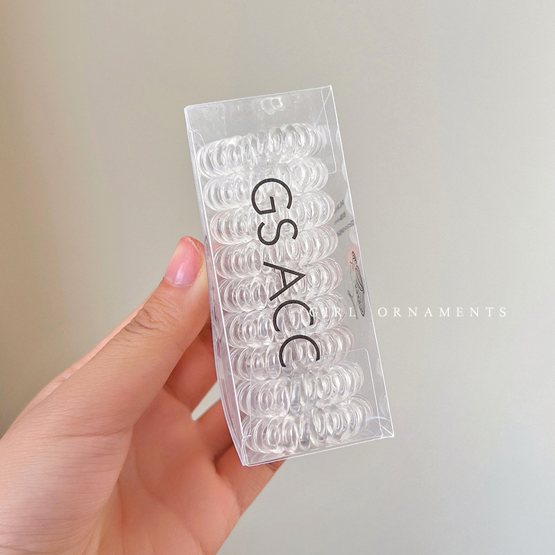 9 vnt. pakuotė ~ palaipsniui keičiami telefono linijos plaukų žiedai dėžutėje paprasti, labai elastingi, permatomi, be pėdsakų galvos apdangalai mergaitėms