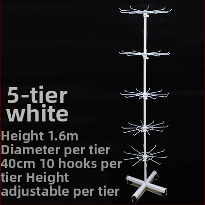 Daugiasluoksnė gatvės prekystalio besisukanti lentynėlė, karoliai, automobiliams pakabinami karoliukai, virvelės, kojinės, skrybėlių papuošalų lentynėlė, parduotuvės durų pakabinamas stovas, vitrina 1