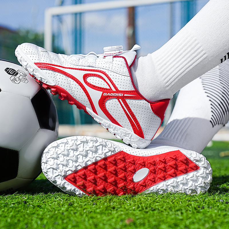 Jaunas bērnu futbola apavi studentiem zēniem TF sasmalcinātu nagu rotējošas sprādzes sieviešu treniņu apavi pārrobežu mākslīgā zāliena futbola apavi