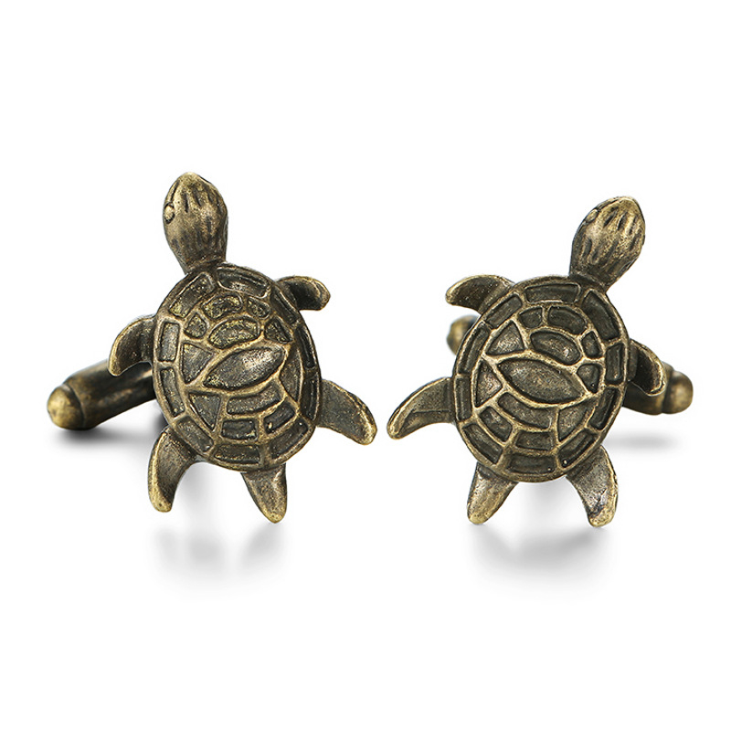 Francia ing mandzsettagombok réz anyagból, arany és ezüst kétszínű, kristály mandzsettagombok, mandzsettaszegek, golyó alakú teknős, szarvasfej, hal alakú mandzsettagomb