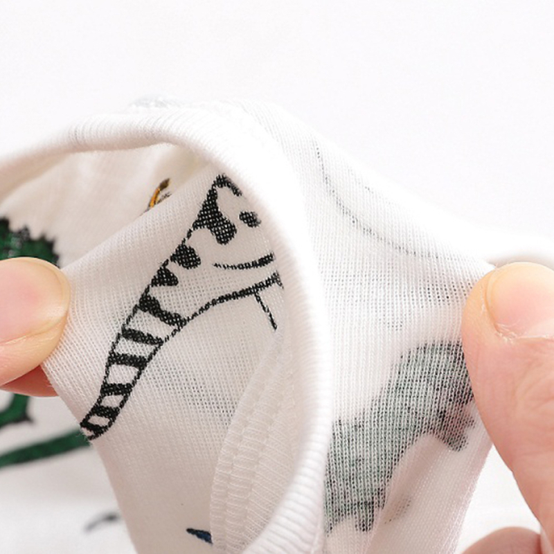 Eiropas un Amerikas Savienoto Valstu pārrobežu zēnu kokvilnas biksītes ar multfilmas dinozauru rakstiem, bērnu apakšveļas vairumtirdzniecība.