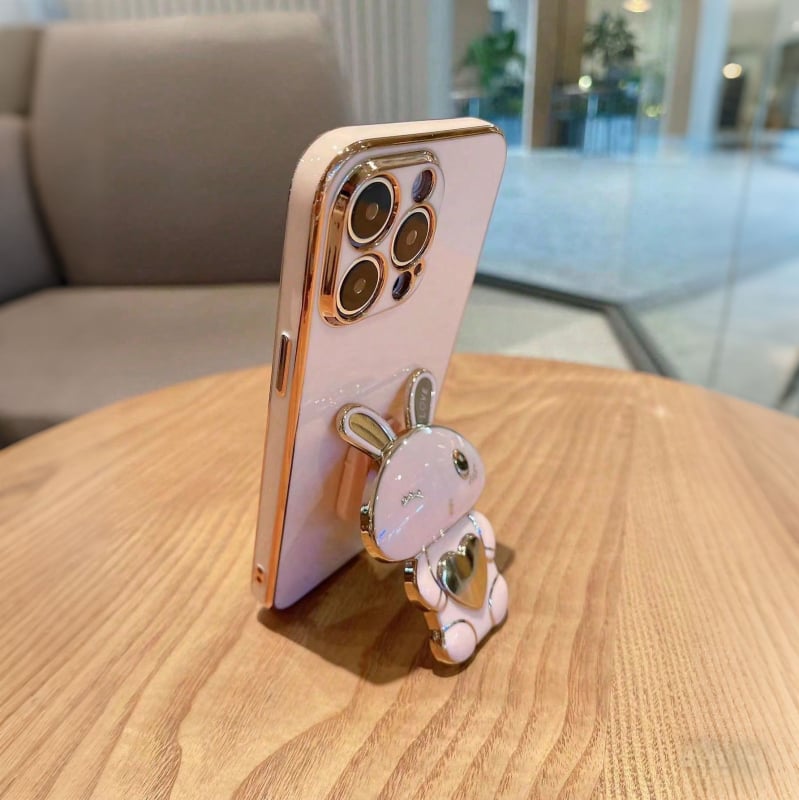 Izsmalcināts, radošs rozā truša statīva iPhone maciņš