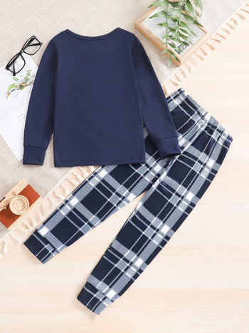 Sõltumatu jaama tarnija Zhongdas poiste ühevärvilised pikkade varrukatega ruudulised püksid koduriiete pidžaamaülikonnad