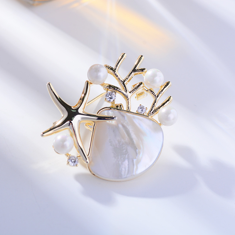 Korėjietiška naujos giliavandenės kriauklės imitacijos sagės versija, madinga kalnų krištolo ir jūros žvaigždės sagė, elegantiški, elegantiški palto aksesuarai, didmeninė prekyba sandėlyje