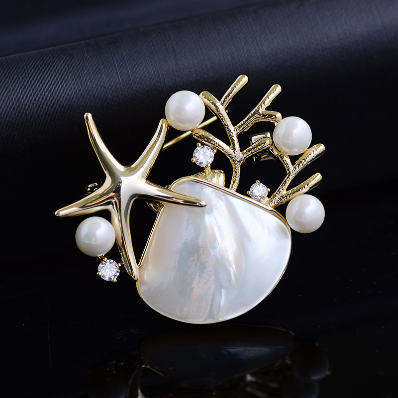 Korėjietiška naujos giliavandenės kriauklės imitacijos sagės versija, madinga kalnų krištolo ir jūros žvaigždės sagė, elegantiški, elegantiški palto aksesuarai, didmeninė prekyba sandėlyje