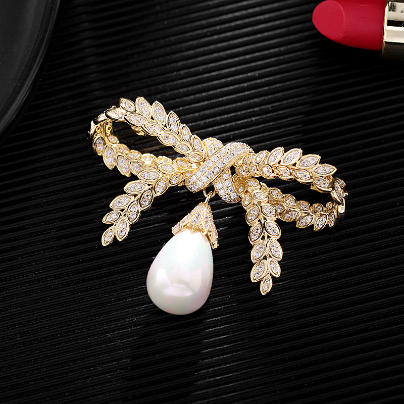 Auksinių kviečių perlų mikroinkrustuotas cirkonio kaspino sagė, atmosferinė madinga apykaklės smeigtukas, palto korsažo smeigtukas